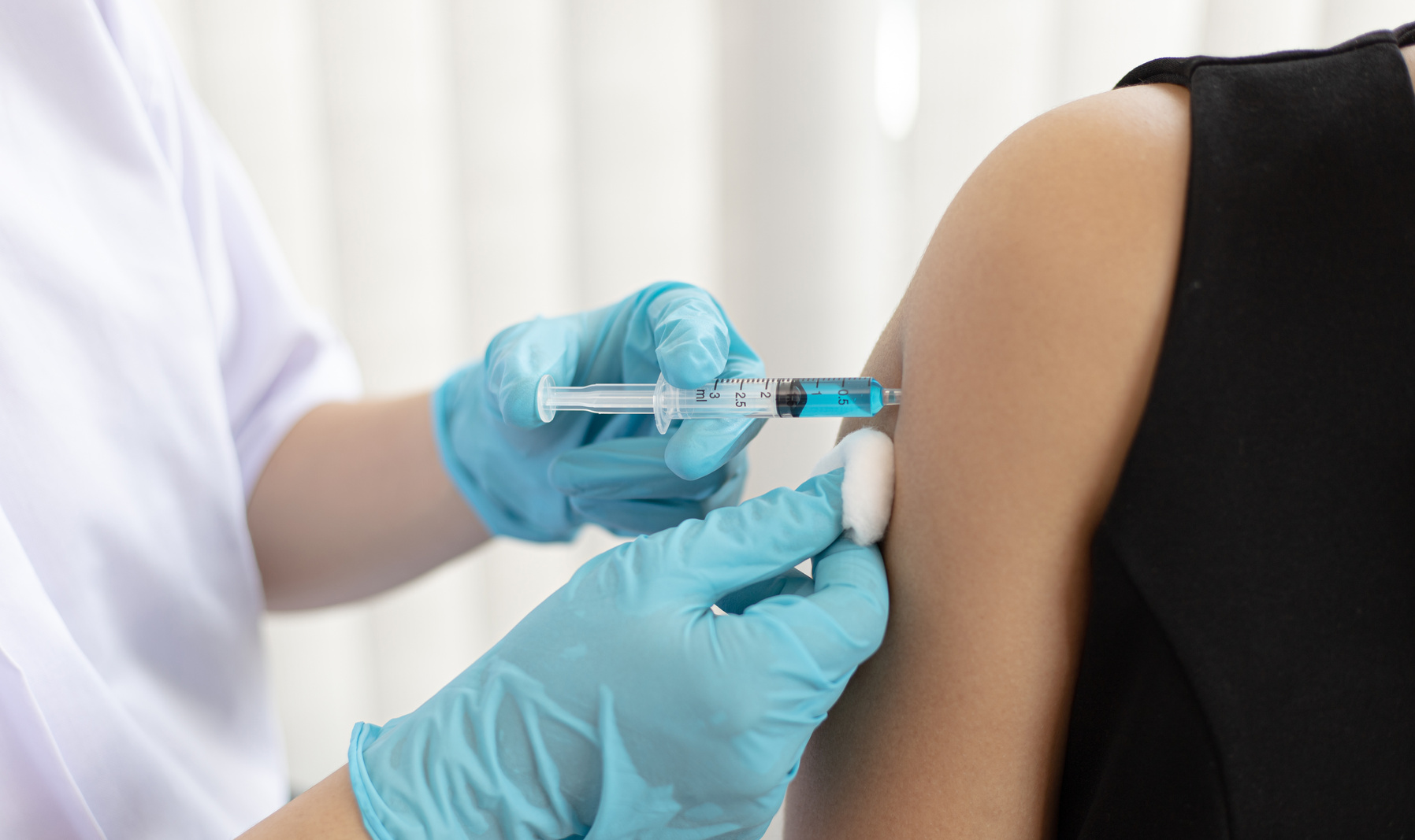 Doctor Administering Vaccine  